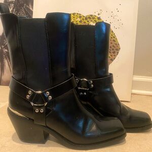 Black leather motorcycle boots.